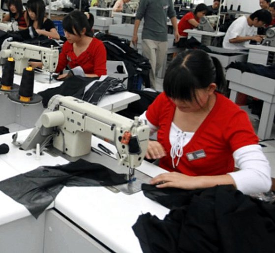 Garment workers at sewing stations